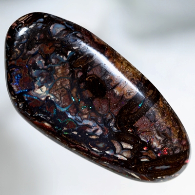 SOLID BOULDER OPAL HUGE 47ct Sparkling red, green and blue amongst patterned boulder opal SEE VIDEO